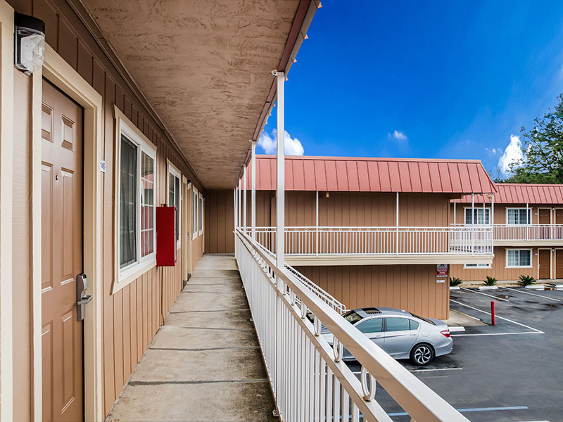 Exterior parking area and walkway at Americas Best Value Inn Ukiah